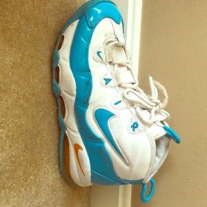 Air uptempo’s, sky blue and shite with a gold trim